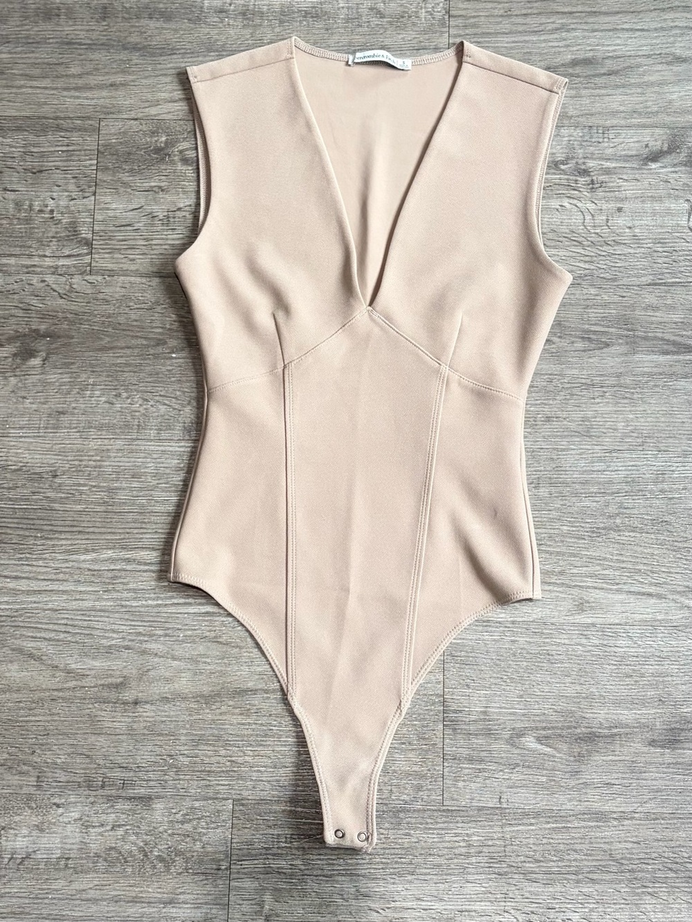 Women’s Sleeveless V-Neck One-Piece Bodysuit in Nude